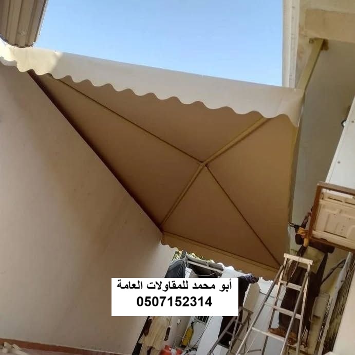 تنفيذ مظلات سيارات لمشروع مبنى تجاري في الظهران